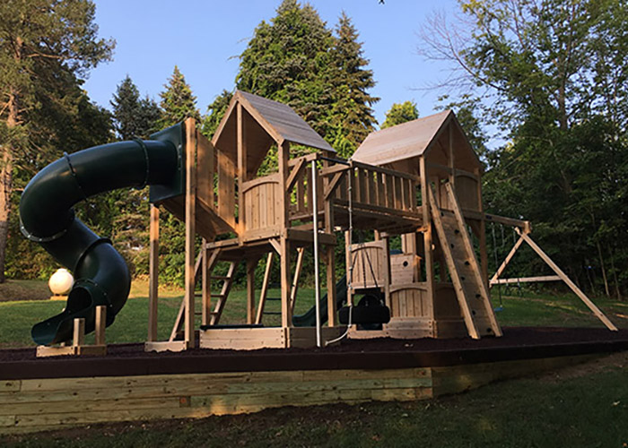 Double cedar swing set with loads of options in Athol, MA