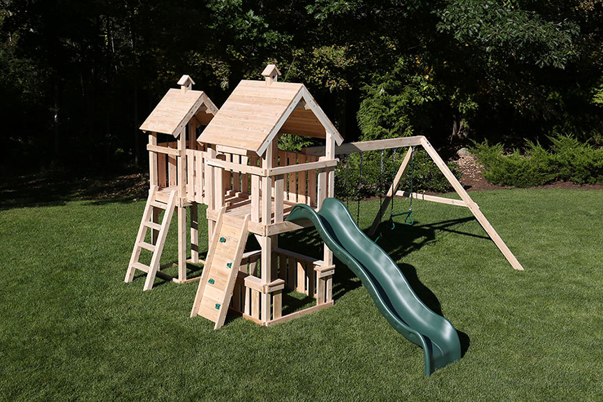 Cedar wooden backyard playset with two towers and bridge