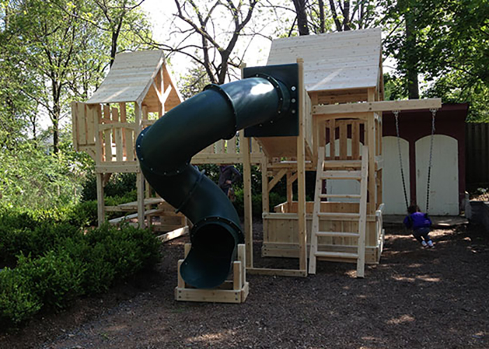 Majestic double swing set designed for a tight space in Millburn, NJ