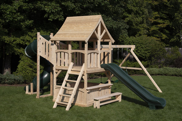 Majestic outdoor swing set with large play fort, a tube slide and 3 swings.
