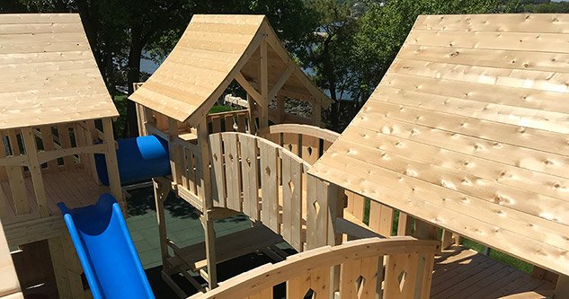 Close up of Triumph's Majestic cedar swing set