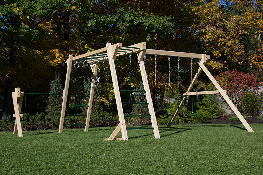 Cedar play set with monkey bars and 3 swings.