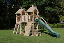 Wooden swing set with Rock wall climbing ladder.