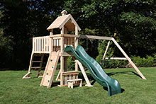 Wooden swing set with Rock wall climbing ladder.