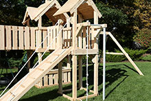 Wooden swing set ramp.