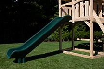 Triumph Play System's Havendale with arched wood roof and slide.