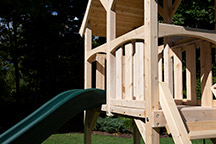 Triumph Play System's Havendale with arched wood roof and slide.