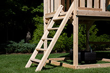 Triumph Play System's flat step cedar swing set ladder.