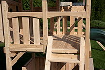 Triumph Play System's kelton deluxe cedar swing set play deck.