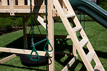 Triumph Play System's Kelton Space Saver trapeze swing and cedar ladder