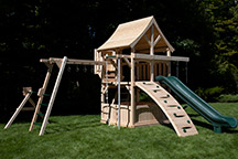 Triumph Play System's Kelton Space Saver Loaded cedar with monkey bars and rings.