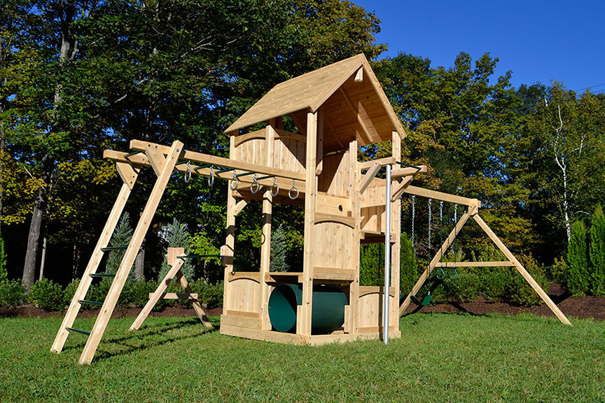 Cedar swing set with five levels, wood roof, rock wall, crawl tube and slide.