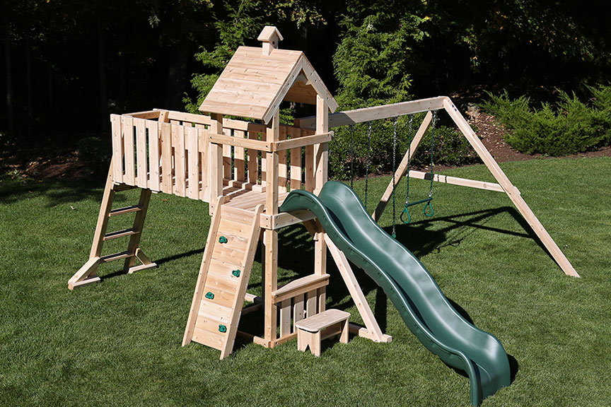 Swing set with small tower and ladder with gangway.