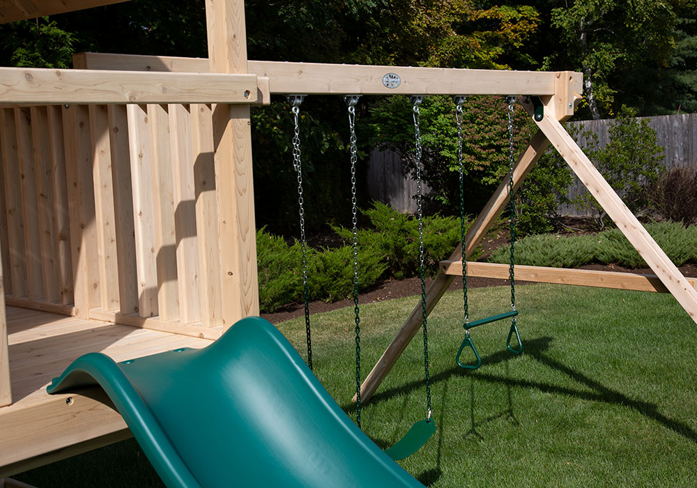 Triumph Play System's Bailey wooden swing set with three swings.
