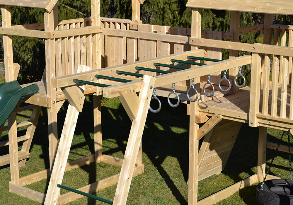 Triumph Play System's classic double double cedar swing set with bridge.
