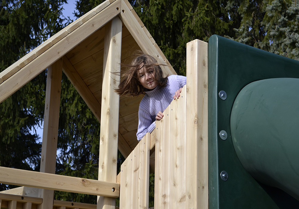 Triumph Play System's Dunmore cedar swing set with tube slide.