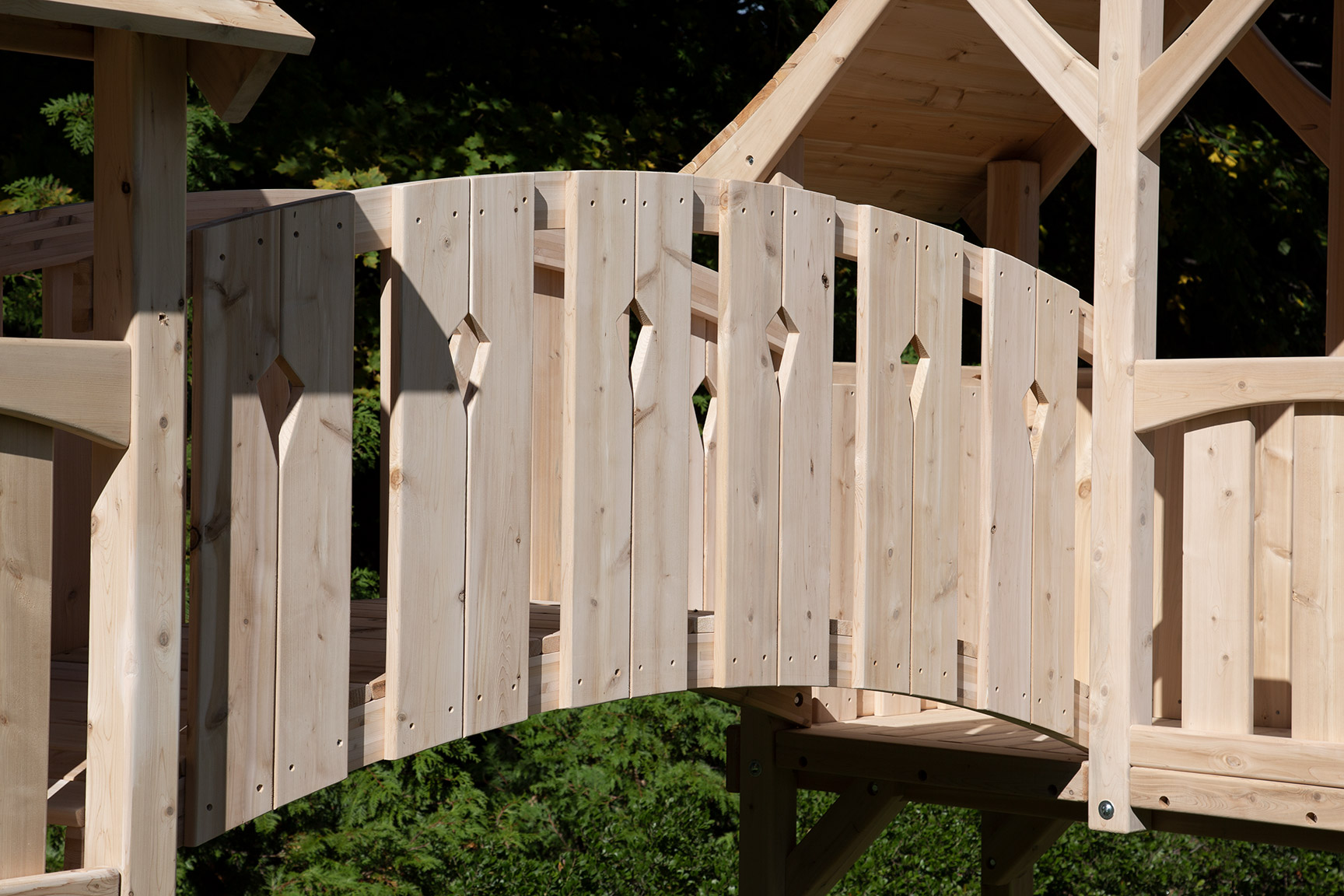 Arched diamond bridge conneting two play set forts